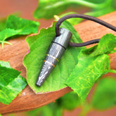 Bullet style pendant with adjustable leather cord